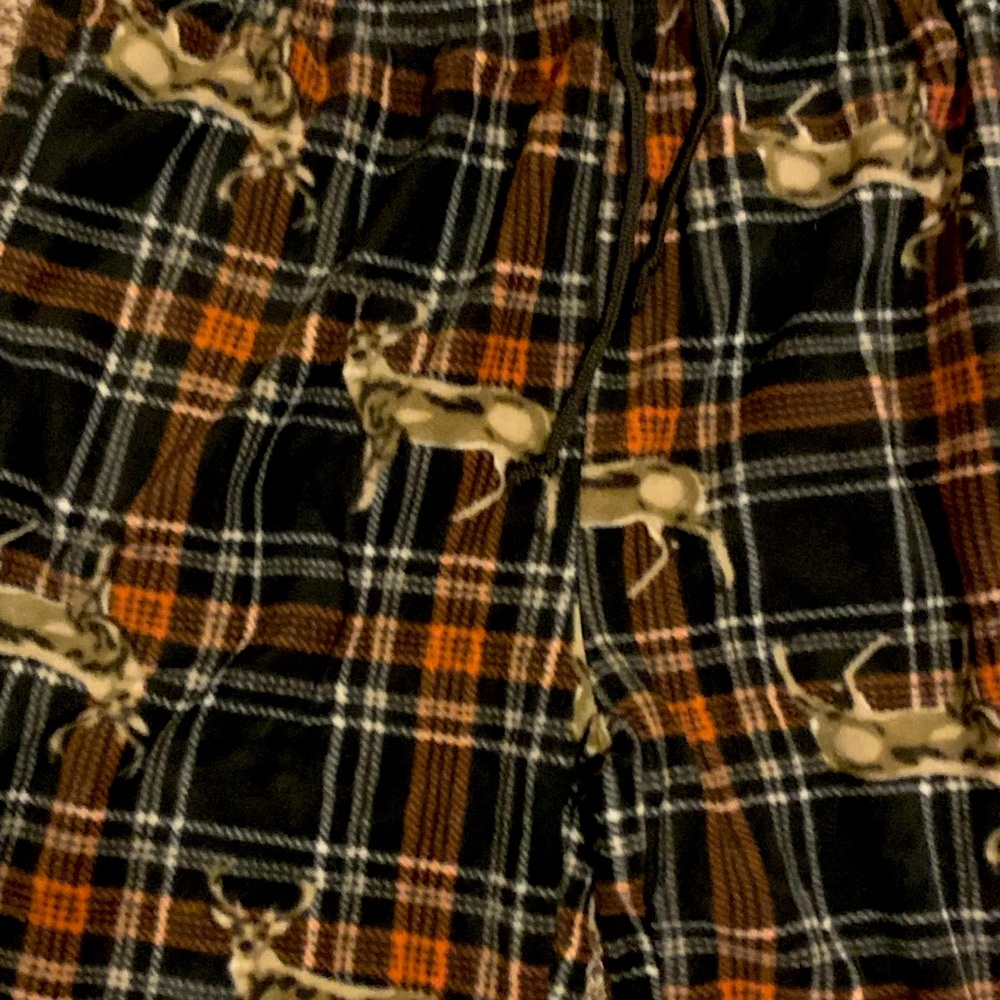 One Pair of comfy sleeping pants, never worn.       Deer print/ size: Large